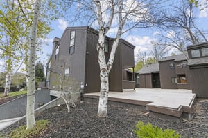 The entry to Three Kings 83 blends classic mountain architecture with the natural beauty of the surrounding aspens and pines — a peaceful first impression that sets the tone for your stay.