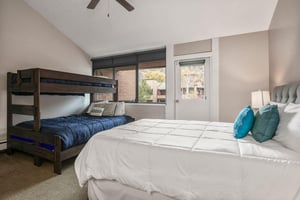Plenty of room for everyone in the second bedroom at Park Avenue 296. With a queen bed and one set of bunk beds, this flexible sleeping space makes this Park City condo rental an ideal choice for fami