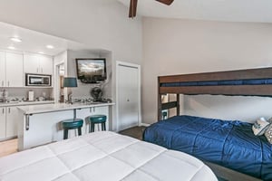 Plenty of room for everyone in the second bedroom at Park Avenue 296. With a queen bed and twin over full bunk bed, this smartly designed space makes this Park City condo rental an ideal choice for fa