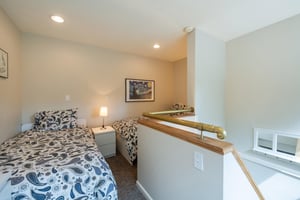 This cozy twin bedroom offers a comfortable and quiet retreat for every member of the group. Smart, flexible sleeping arrangements are just one of the perks of this Park City condo rental.
