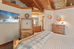 Wake up to mountain charm in the spacious king bedroom at 1296 Pinnacle — a standout Park City vacation rental just steps from Deer Valley Resort.