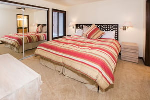 Three Kings 37 ensures a restful nights sleep with a comfortable king bedroom featuring bold, colorful accents and stylish furnishings that bring a unique and memorable flair to this Park City condo 