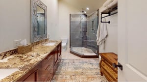 From the gorgeous walkin shower to the beautifully crafted wooden vanity and intricate granite countertops, the master bathroom at Three Kings 64 exemplifies the exceptional attention to detail.