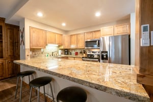 No need to eat out every night — Resort Plaza 5002 offers a gorgeous chefworthy kitchen complete with granite counters, modern appliances, and a convenient breakfast bar.