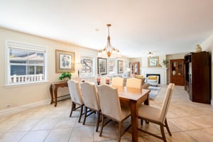 Gather around the elegant dining table at Resort Plaza 5004 — which offers a beautiful formal dining space with seating for the whole group, a stunning chandelier, and an open flow into the living are