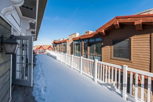 Fresh snow and mountain charm surround Resort Plaza 5007.