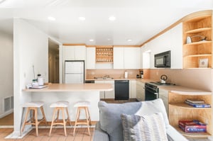 he openconcept kitchen and living area flows together comfortably — pull up a seat at the breakfast bar or settle onto the sofa after a day outdoors.