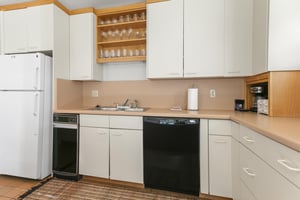 From morning coffee to aprèsski dinners, this kitchen comes ready with a dishwasher, full cookware, and generous cabinet storage.