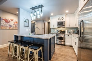 Bright, functional, and beautifully designed, the kitchen at Resort Plaza 5000 makes homecooked meals a pleasure — one of the many thoughtful touches that set this skiinskiout Park City vacation r