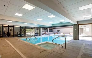 Guests enjoy access to this fantastic indooroutdoor pool and hot tub, both offsite and just steps away.