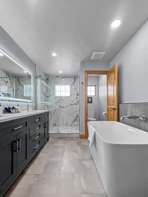 Indulge in your own spalike sanctuary with a stunning soaking tub, elegant walkin shower, and sleek modern finishes perfect for unwinding after your adventures.