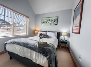 Sink into your plush bed after a day on the slopes—crisp linens, soft throws, and mountaininspired décor set a cozy, restful scene perfect for recharging.