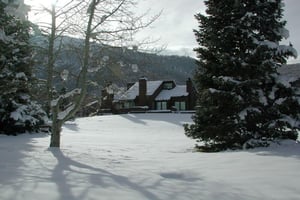 Three Kings 80 is a stunning winter wonderland retreat, nestled in a serene snowy setting that perfectly captures the magic of a Park City lodging experience during ski season.