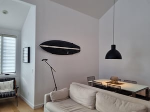 Surfboard in Living Room of Three Kings 80