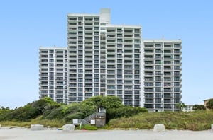 View from the beach of One Seagrove Place on Highway 30A in Florida