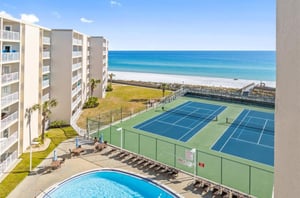 Holiday Surf  Racquet Clubs beachside tennis courts and swimming pool.