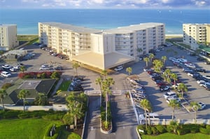 The complex with the Gulf in the background.