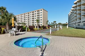 The communitys hot tub and shuffleboard courts.