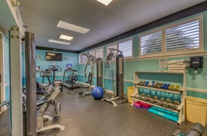 The wellequipped fitness room.