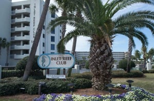 Inlet Reef Clubs entrance sign.