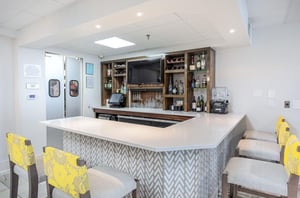 The onsite bar with stools at Hilton Garden Inn at Orange Beach Alabama