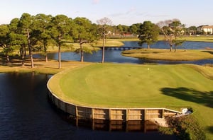 A green set amid lakes