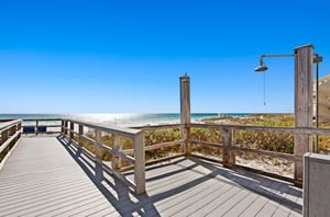 A boardwalk provides easy access to the beach from the complex