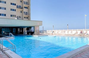 Relax at the large pool at Pinnacle Port in Panama City Beach FL