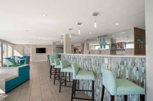 The Inn on Destin Harbors bar offers beer, wine, and a view of the harbor.