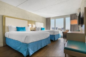 A twin queenbed room.