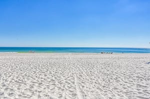 The sandy white beaches and Gulf in front of Seascape
