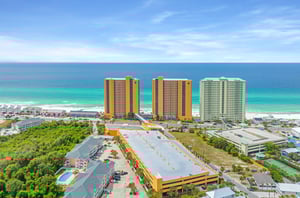 View of the streetside exterior of Splash Resort with a large complimentary parking deck in front