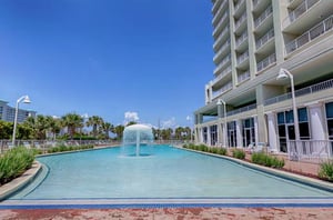 The pool with a mushroom fountain provides a great place to splash and play.