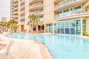 The outdoor swimming pool in front of Aqua Resort in Panama City Beach Florida
