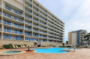 Balconies oversee this hot tub and community pool