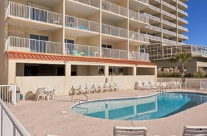 Relax by the outdoor, beachfront swimming pool