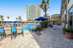 Unwind by the water with poolside lounge chairs