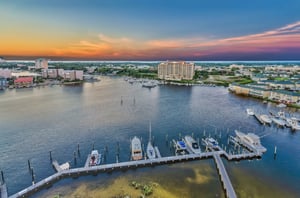 View of the bay and Destin Harbor at sunset from a private balcony