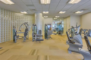 Strength and cardio equipment in the fitness center at Escapes to the Shores