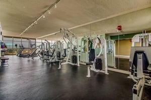 The onsite fitness center with cardio and strength equpiment at Sandy Key in Perdido Key Florida