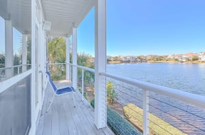 Some villas balconies look out over a rare coastal dune lake.
