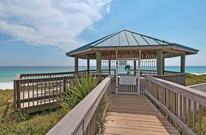 A private boardwalk and gazebo lead to a private beach.