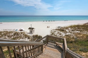 Stairs from the gazebo lead directly down to the beach.