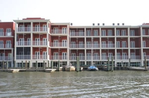 Relax with private balconies and rental boat slips right out back