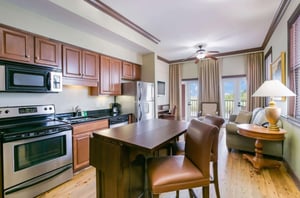 The fully furnished kitchen in a suite at Water Street Hotel  Marina