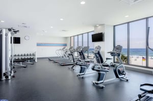 Cardio and strength equipment in the Gulffacing fitness center