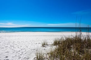 The beautiful adjacent white and turquoise coastline