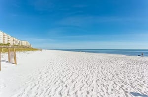 A long stretch of white sandy beach on the Gulf of Mexico