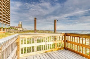 The outdoor showers on the wooden boardwalk at Island Royale