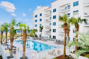 Soak up some sun by the sparkling outdoor swimming pool